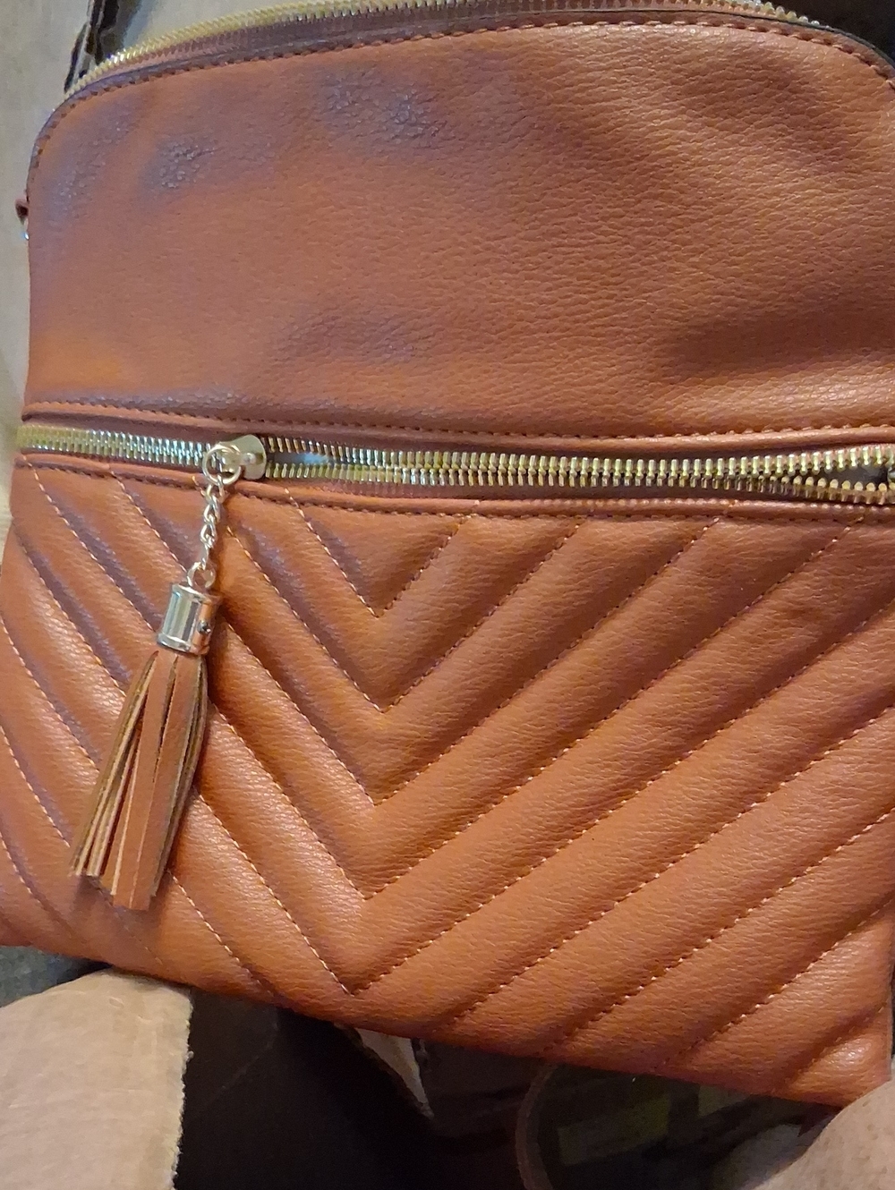 Women's Quilted Tassel Crossbody Bag - Brown